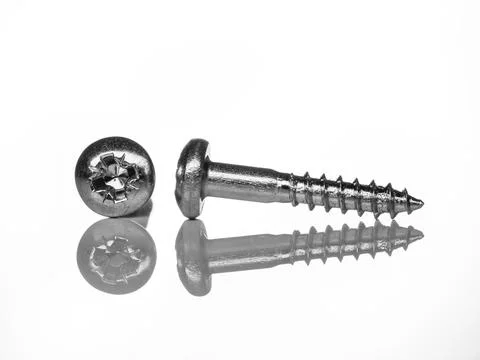 Screw with clipping path (macro), lots of detail, white background, half scre Stock Photos