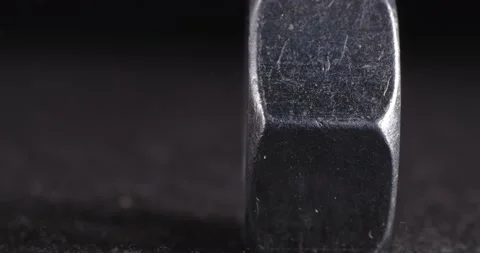 Screw close-up on a dark background. Fastener. Stockbeeldmateriaal 165265108