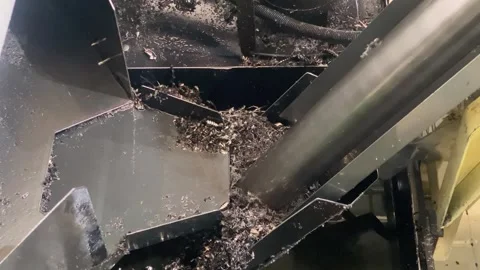 Screw Conveyor Metal Scrap Separator in CNC Manufacturing Process Stock Footage 337984706
