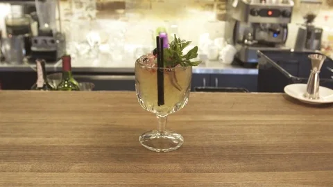 Screw driver cocktail with fresh mint on the dark background Stock Footage 73984348