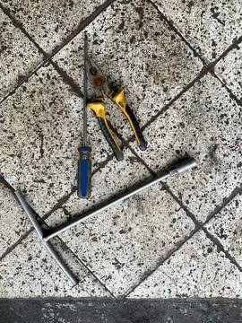 Screw driver, plier and another tool (equipment) for car and motorcycle repai Stock Photos
