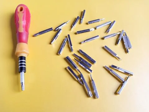 The screw-driver with a set of various nozzles. Interchangeable screwdriver.. Stock Photos