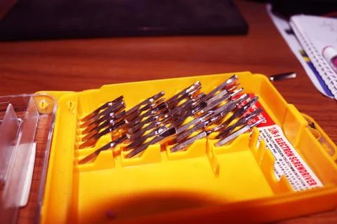 Screw Driver Set on yellow Box.Interchangeable screwdriver set with different Stock Photos