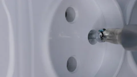 Screw in electrical plug Stock Footage 145757779