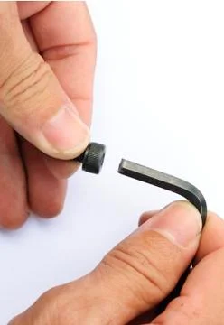 Screw With Hand Stock Photos