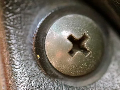 Screw head in dark room with shadow light Stock Photos