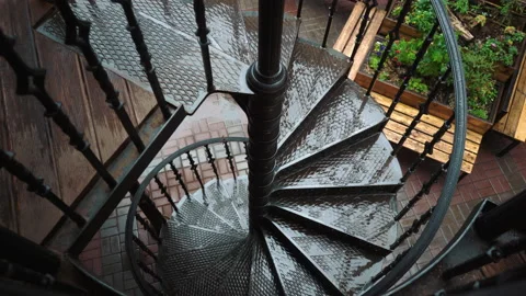 Screw metal stairs while rain is going Stock Footage 158553539