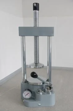 Screw press Stock Photos