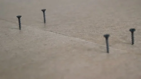 Screw in a row Stock Footage 39968681