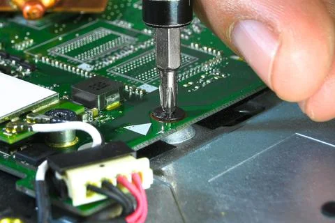 Screw screwdriver using by electrician Foto stock