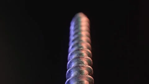 Screw thread of the screw rod close-up on a black background. Production of Stock Footage 160110934