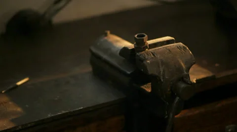 Screw Tightening in an old metal Workshop Stock-Footage 34435853