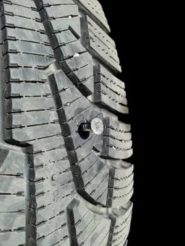Screw in tire Stock Photos