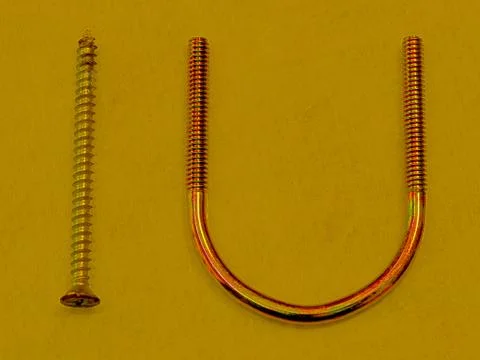 SCREW U YELLOW BACKGROUND Foto stock