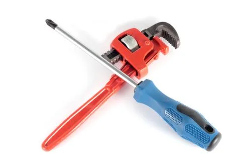 Screwdriver and adjustable wrench Stock Photos