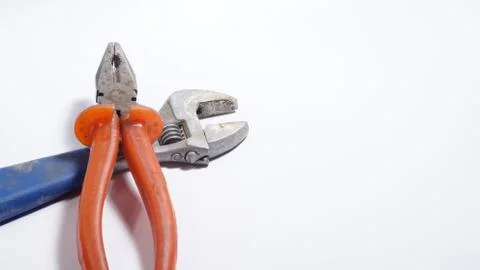 Screwdriver and pliers Stock Photos