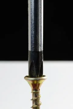 Screwdriver and screw Stock Photos