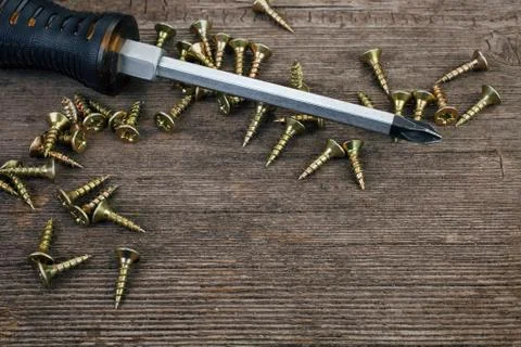 Screwdriver and screws Stock Photos
