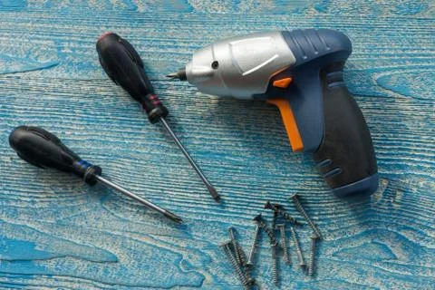 Screwdriver and screws Stock Photos