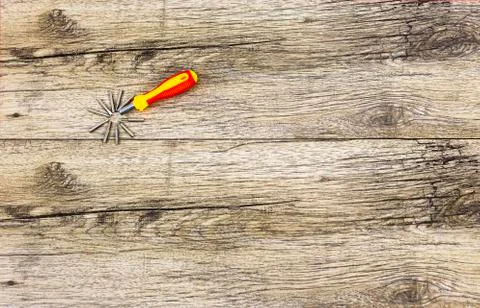 Screwdriver with attachments on background Stock Photos