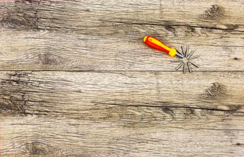 Screwdriver with attachments. Stock Photos