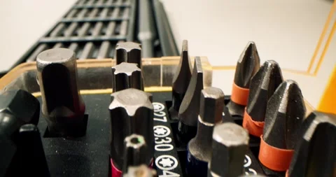 Screwdriver bit set box on purple bacground. Close up of Hexagon, Phillips Stock-Footage 308661918