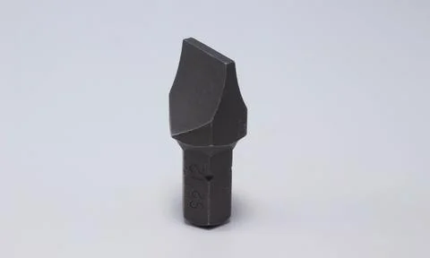 Screwdriver bit on a white background close-up Stock Photos