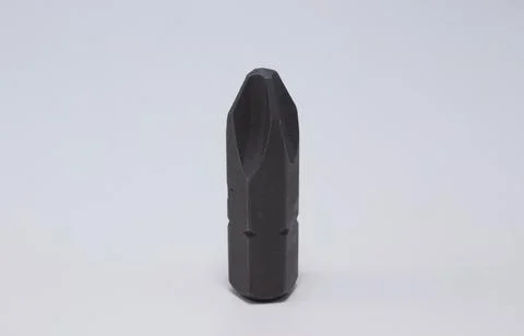 Screwdriver bit on a white background close-up Stock Photos