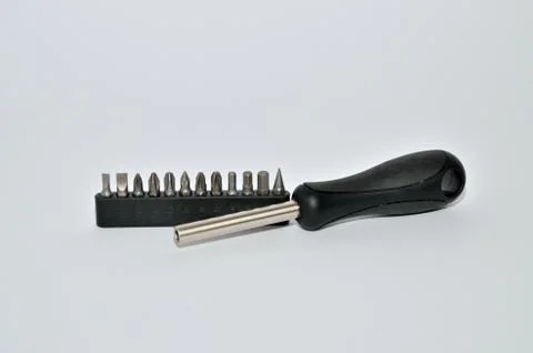 Screwdriver with interchangeable bits Stock Photos