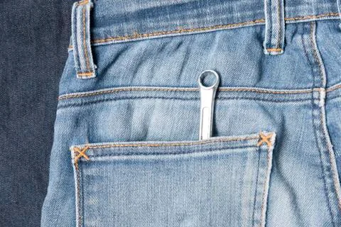 Screwdriver in jean Stock Photos