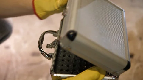 Screwdriver long bits extension accessory set. Silver aluminium case. Worker. Stock Footage 126327323