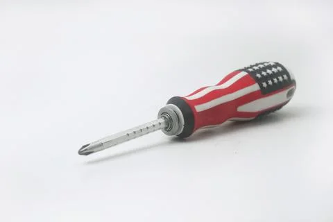 A screwdriver patterned with the colors of the American flag Stock Photos
