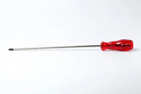 Screwdriver with red grasp Stock Photos