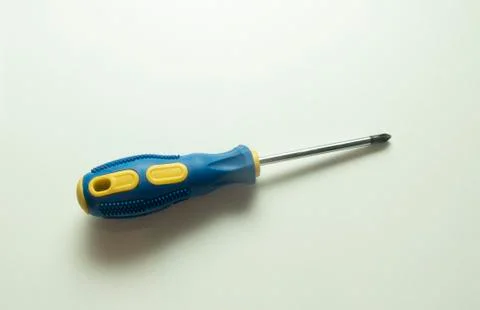 Screwdriver. Screwdriver on a white background. Screwdriver with blue and yel Stock Photos
