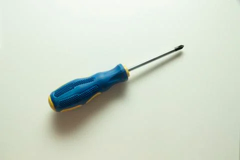 Screwdriver. Screwdriver on a white background. Screwdriver with blue and yel Stock Photos