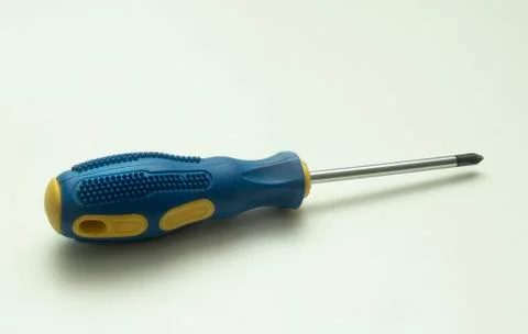 Screwdriver. Screwdriver on a white background. Screwdriver with blue and yel Stock Photos