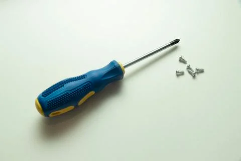Screwdriver. Screwdriver on a white background. Screwdriver with blue and yel Stock Photos