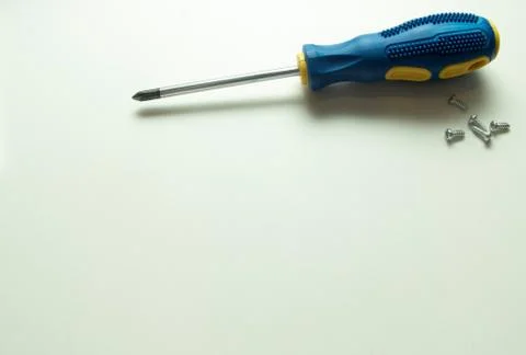 Screwdriver. Screwdriver on a white background. Screwdriver with blue and yel Stock Photos