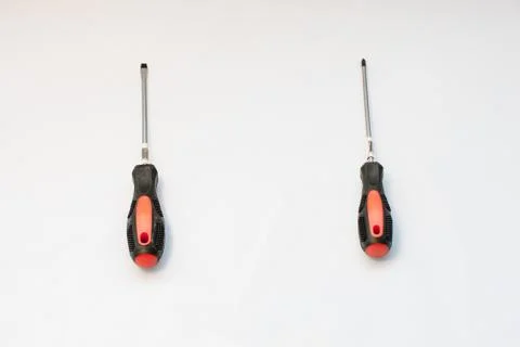 Screwdriver. Screwdriver on a white background. Screwdriver with orange handl Stock Photos