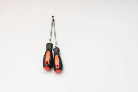 Screwdriver. Screwdriver on a white background. Screwdriver with orange handl Stock Photos