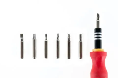 A screwdriver with a set of changable nozzels isolate on white background Stock Photos