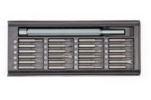 Screwdriver with set of interchangeable bits in case, top view Foto stock