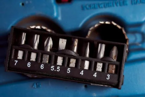 Screwdriver set tips in a plastic case. Top view. Stock Photos