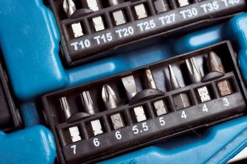 Screwdriver set tips in a plastic case. Top view. Stock Photos