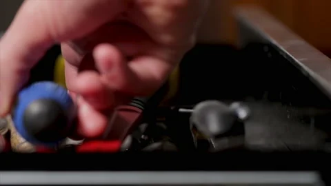 Screwdriver in tool box close up hand picking up screw driver to use from tool b Stock Footage 138118461