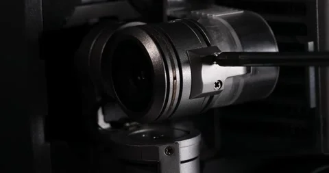 The screwdriver turns disassembles the camera of the quadcopter close up Stock Footage 155922698