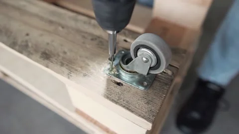 Screwdriver twists the screw. Stock Footage 131826306