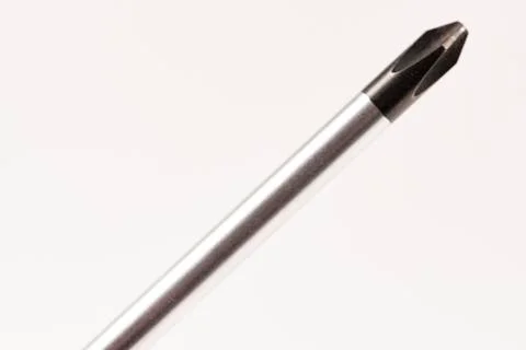 Screwdriver on white background. Macro or close up Stock Photos