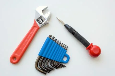 Screwdriver, wrench and hexagonal L key set isolated on white background. Stock Photos