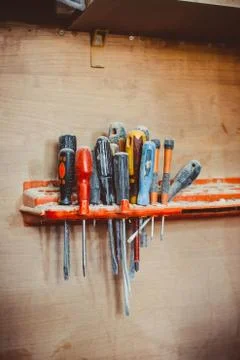 Screwdrivers hanging in the workshop Fotos Stock